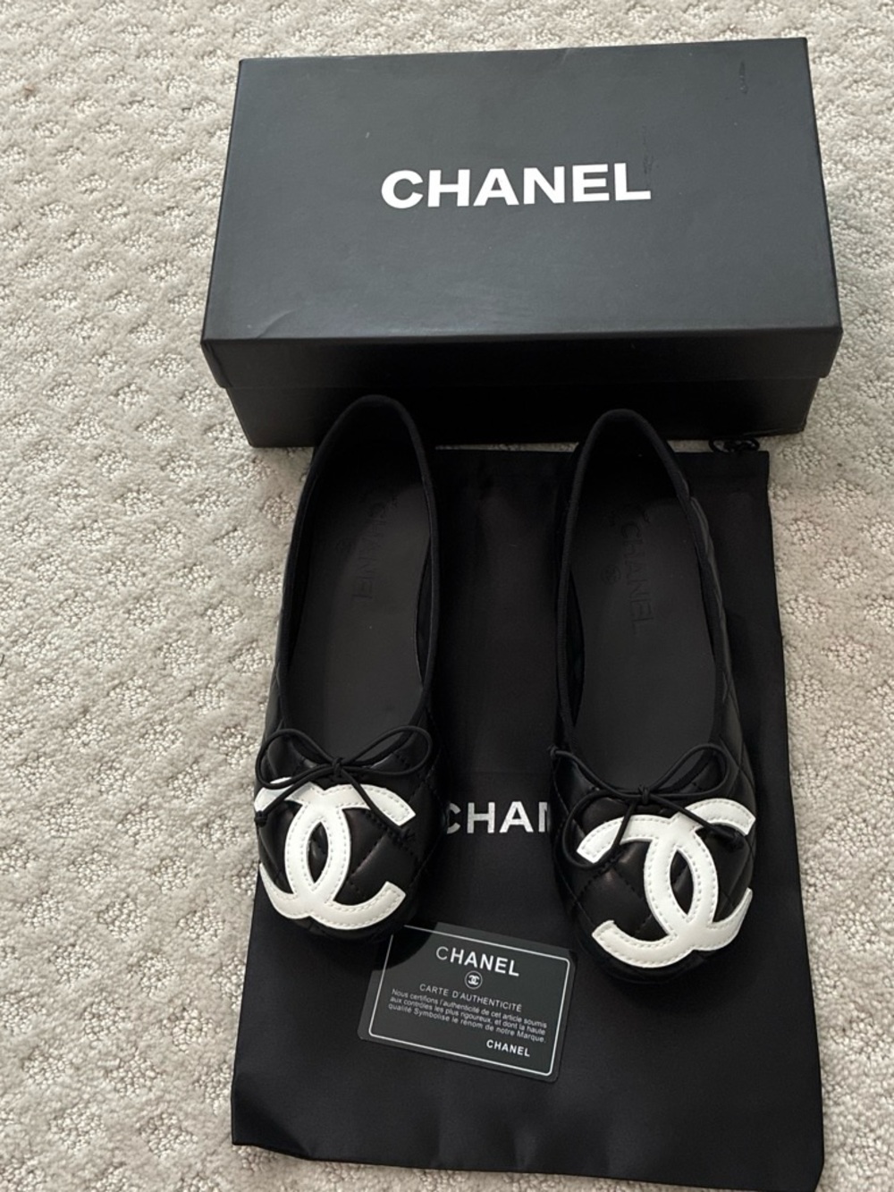 CHANEL Black Cap-Toe Ballet Flats with White CC Logo